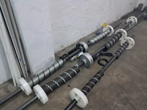 Sustitución de muelles de torsión y tambores para el mantenimiento de persianas industriales.