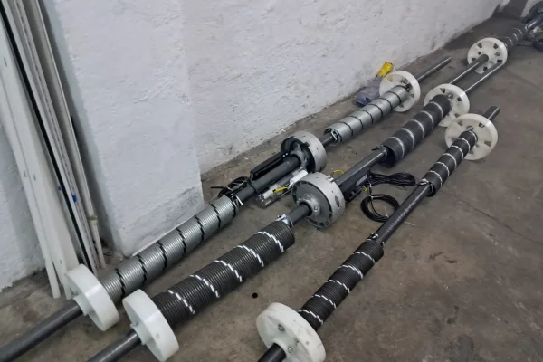 Sustitución de muelles de torsión y tambores para el mantenimiento de persianas industriales.